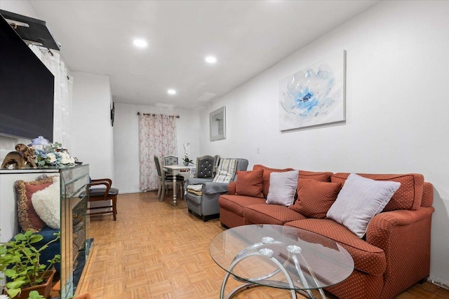 living room with light parquet floors