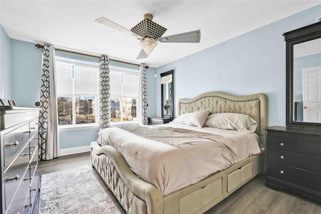 192 Bch 74th St, Arverne, NY 11692 - bedroom with wood finished floors, a ceiling fan, and baseboards