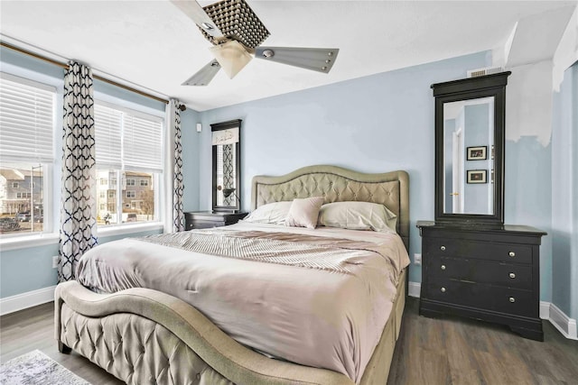 192 Bch 74th St, Arverne, NY 11692 - bedroom with wood finished floors, baseboards, and ceiling fan