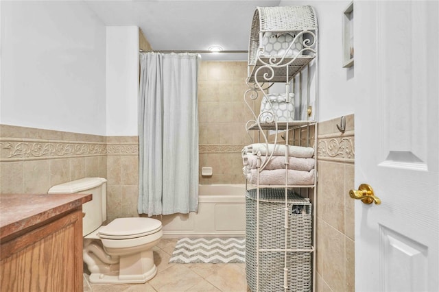 192 Bch 74th St, Arverne, NY 11692 - full bath featuring tile patterned floors, toilet, shower / bath combo, tile walls, and vanity