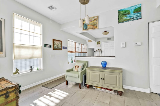 192 Bch 74th St, Arverne, NY 11692 - sitting room with tile patterned floors and baseboards
