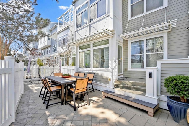 192 Bch 74th St, Arverne, NY 11692 - view of patio featuring fence and outdoor dining space