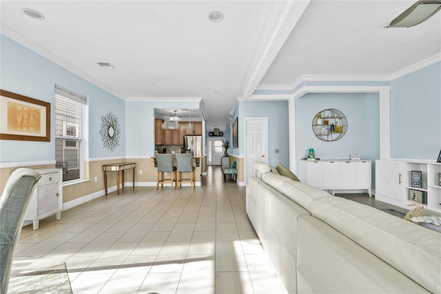 192 Bch 74th St, Arverne, NY 11692 - living area with a chandelier and ornamental molding