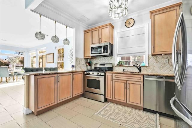 192 Bch 74th St, Arverne, NY 11692 - kitchen with stainless steel appliances, a peninsula, tasteful backsplash, a sink, and pendant lighting