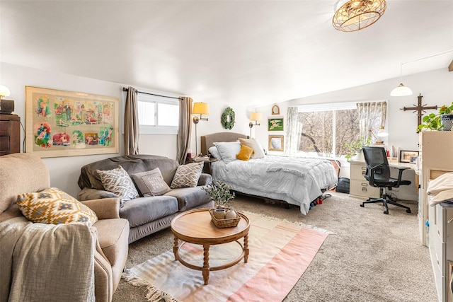 carpeted bedroom featuring vaulted ceiling