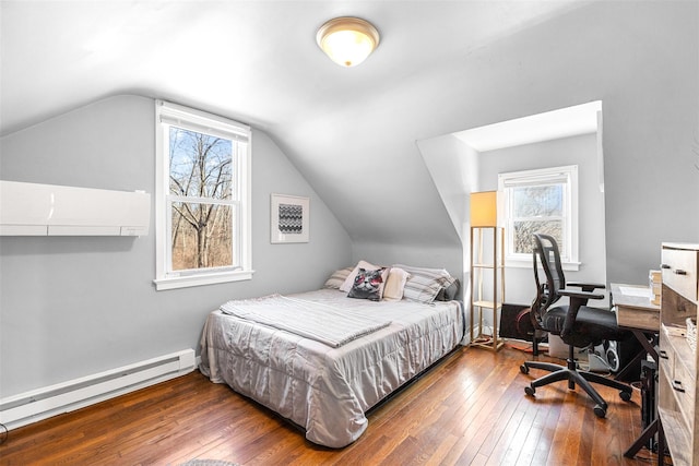 bedroom with a baseboard radiator, wood-type flooring, multiple windows, and vaulted ceiling