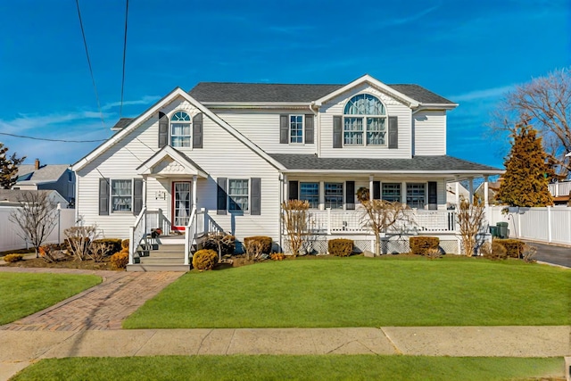 view of front facade featuring a porch and a front lawn