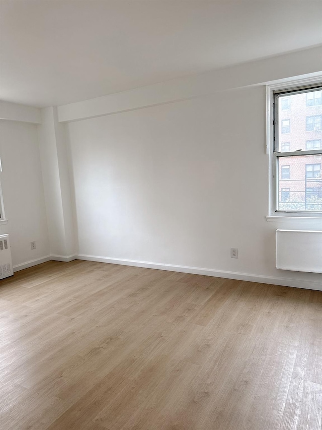 138-10 Franklin Ave Unit 3L, Flushing, NY 11355 - empty room with light wood finished floors
