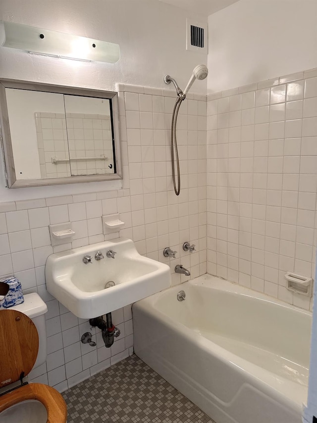138-10 Franklin Ave Unit 3L, Flushing, NY 11355 - full bath with shower / bathtub combination, tile walls, and tile patterned flooring