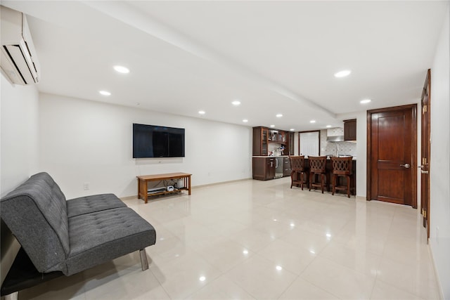 living room with light tile patterned floors, bar area, and a wall unit AC