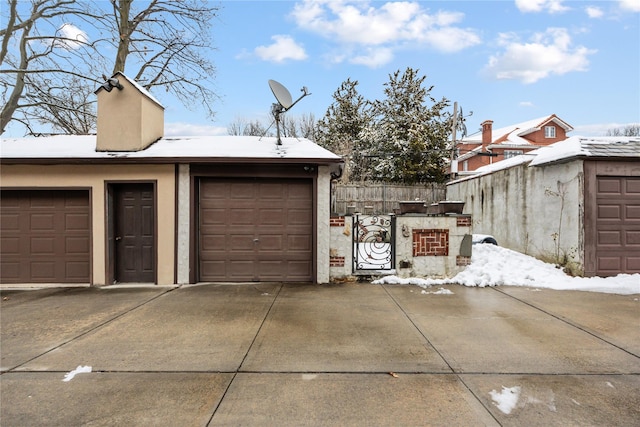 view of snow covered garage