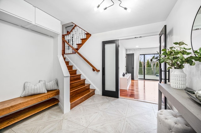 foyer featuring stairway