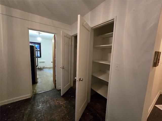 closet with radiator heating unit