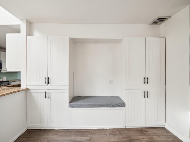 interior space with dark wood-type flooring