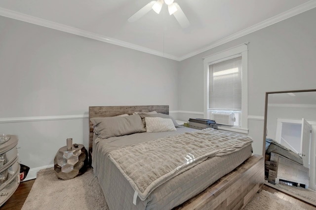 bedroom with crown molding, cooling unit, ceiling fan, and dark hardwood / wood-style flooring