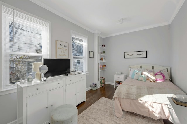 bedroom featuring crown molding and dark wood-type flooring