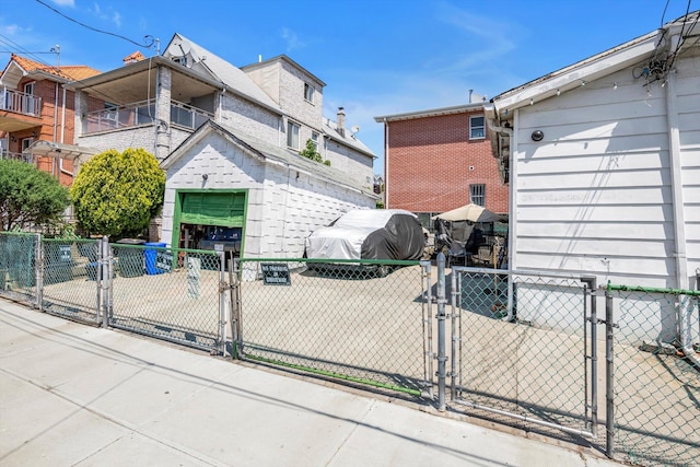 77-01 45th Ave, Flushing, NY 11373 - exterior space featuring brick siding, fence private yard, and a gate
