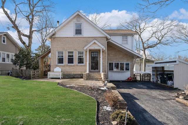 view of property with a front lawn