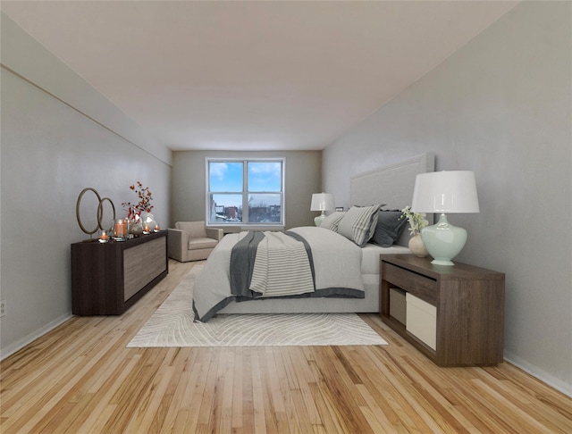 bedroom with light hardwood / wood-style flooring