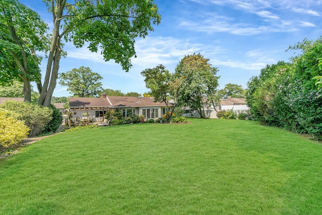 view of yard with fence