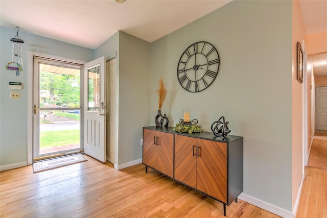 39 Cornwallis Rd, East Setauket, NY 11733 - foyer entrance featuring baseboards and light wood-type flooring