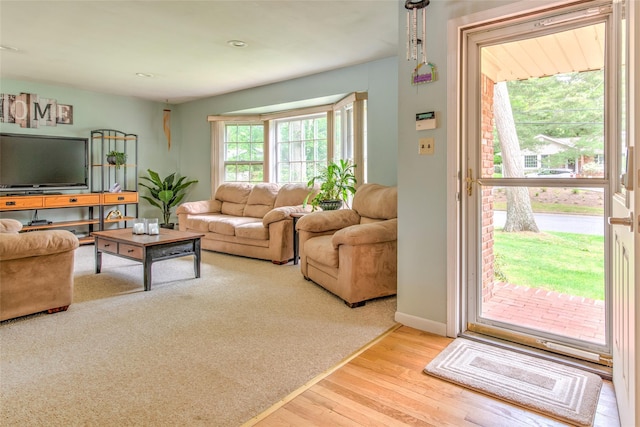 39 Cornwallis Rd, East Setauket, NY 11733 - living room featuring wood finished floors and baseboards