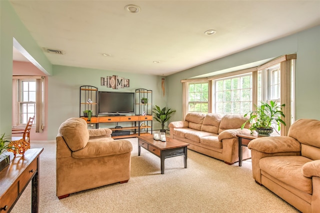 39 Cornwallis Rd, East Setauket, NY 11733 - carpeted living area featuring plenty of natural light and recessed lighting