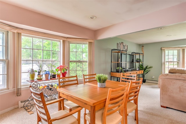 39 Cornwallis Rd, East Setauket, NY 11733 - dining area with light carpet, baseboards, recessed lighting, and a baseboard heating unit