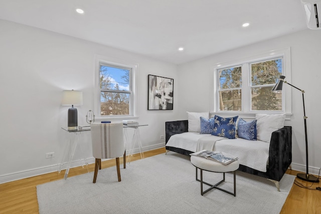 sitting room featuring recessed lighting, baseboards, and wood finished floors