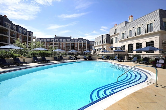 view of pool featuring a patio