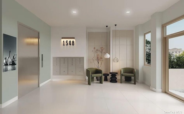 living area featuring light tile patterned flooring and a mail area