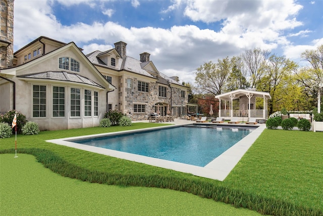 outdoor pool featuring a patio area and a lawn