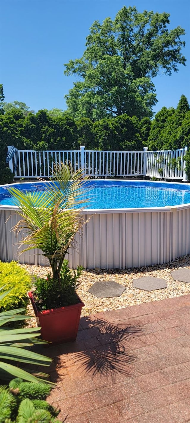 pool featuring fence