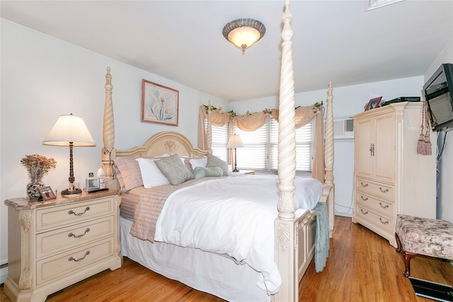 bedroom featuring light wood finished floors