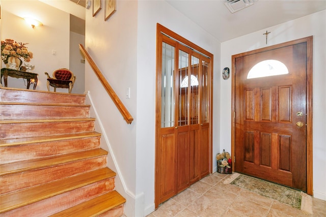 entryway featuring stairway and visible vents