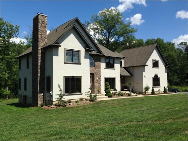 view of front of property with a front lawn