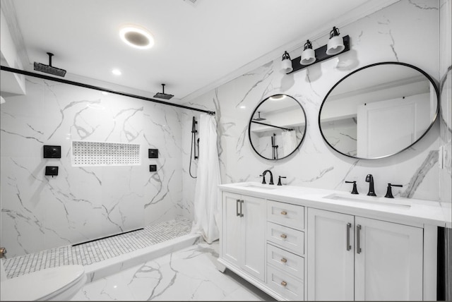 bathroom with vanity, curtained shower, and toilet