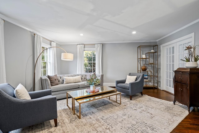 living room with recessed lighting, dark wood-type flooring, baseboards, french doors, and ornamental molding