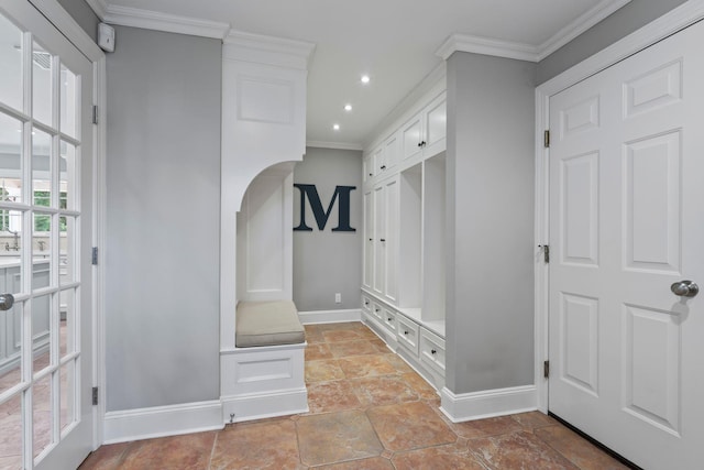 mudroom featuring baseboards, crown molding, and recessed lighting