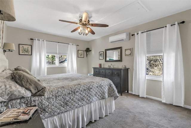 carpeted bedroom with a wall mounted air conditioner and ceiling fan