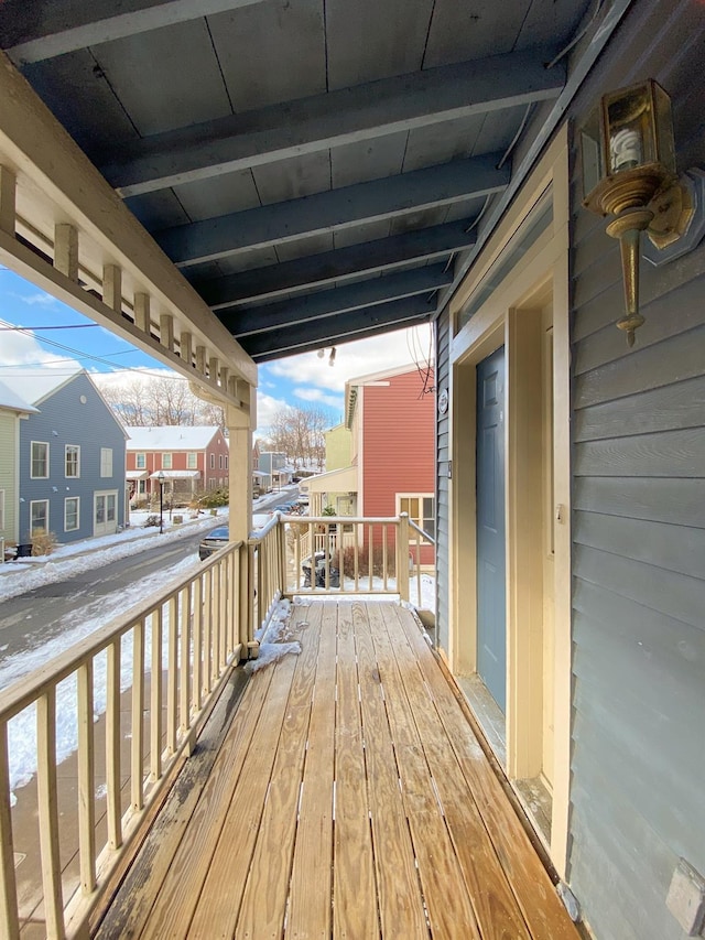 view of snow covered deck