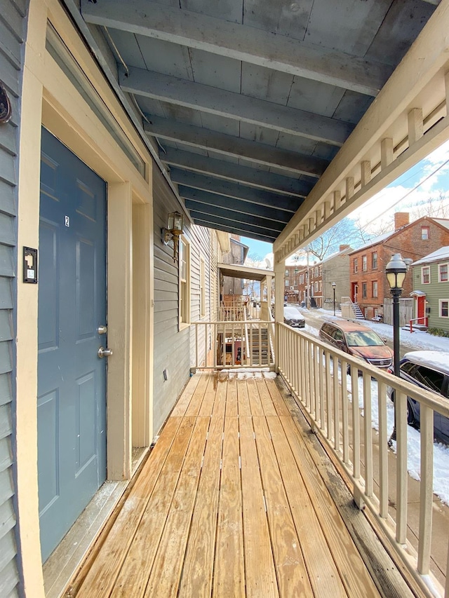 wooden terrace with covered porch