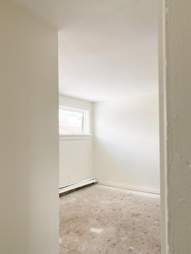 spare room with a baseboard radiator