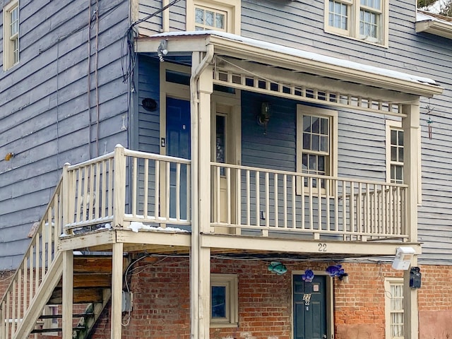 property entrance with a balcony