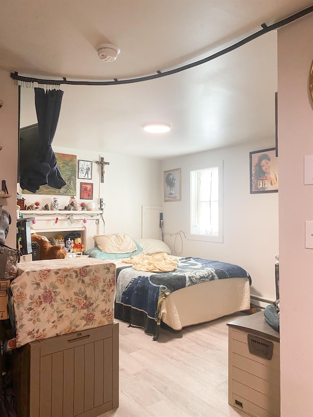 bedroom featuring light hardwood / wood-style floors