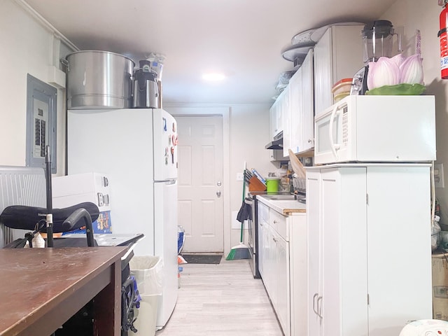 kitchen featuring white cabinetry, white appliances, and light wood-type flooring