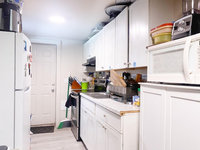 kitchen with white cabinetry, white appliances, and light wood-type flooring