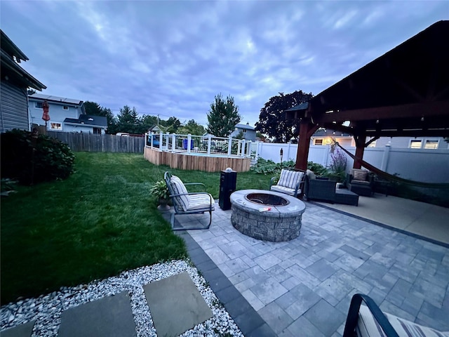 view of patio / terrace featuring a fire pit