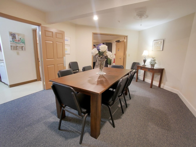 view of carpeted dining area