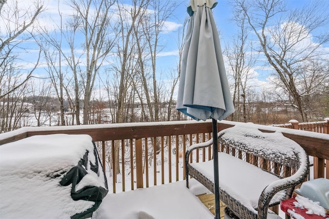 view of snow covered deck